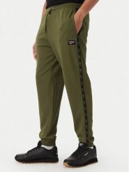 Reebok Spodnie dresowe Jacek RK25723CCM Zielony Regular Fit. Zielone spodnie sportowe męskie Reebok, m, bez wzorów, z dresówki. Za 259.99 zł.
