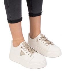 Beżowe sneakersy trampki ze złotymi cyrkoniami beżowy. Brązowe trampki i tenisówki damskie bez wzorów, z materiału, bez zapięcia. Za 84.03 zł.