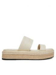Calvin Klein Klapki Flatform Wedge Slide - He HW0HW02374 Kremowy. Białe klapki damskie Calvin Klein, bez wzorów, ze skóry, bez obcasa, bez zapięcia. Za 299.99 zł.