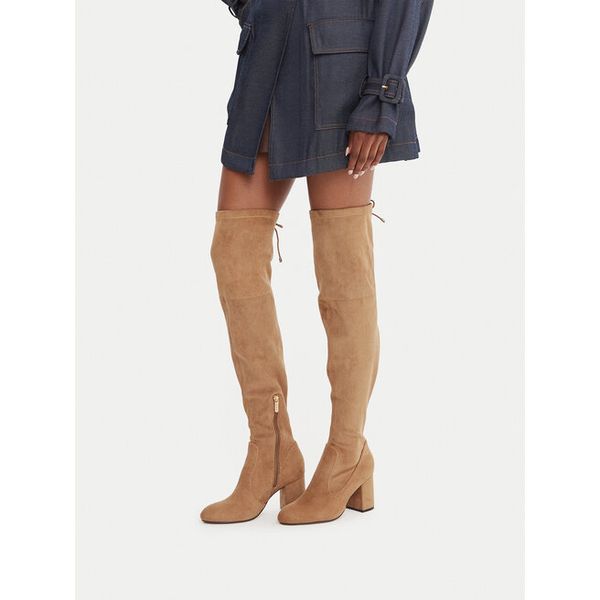 Kozaki Nine West. Brązowe kozaki damskie Nine West, bez wzorów, bez obcasa, na słupku, bez zapięcia. Za 329.99 zł.