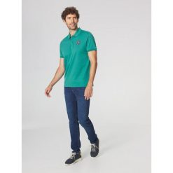 Koszulka polo męska TBS Voldapol. Zielone koszulki sportowe męskie TBS, m, bez wzorów, bez ramiączek, żeglarskie. Za 319.00 zł.