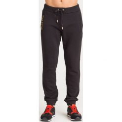 SPODNIE DRESOWE Versace Jeans. Czarne spodnie sportowe męskie Versace Jeans, l, bez wzorów, z bawełny. Za 347.40 zł.