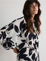 Bawełniana koszula ze wzorem - wielobarwny. Koszule damskie Reserved, l, bez wzorów, z bawełny, bez kołnierzyka, bez ramiączek. W wyprzedaży za 69.99 zł.