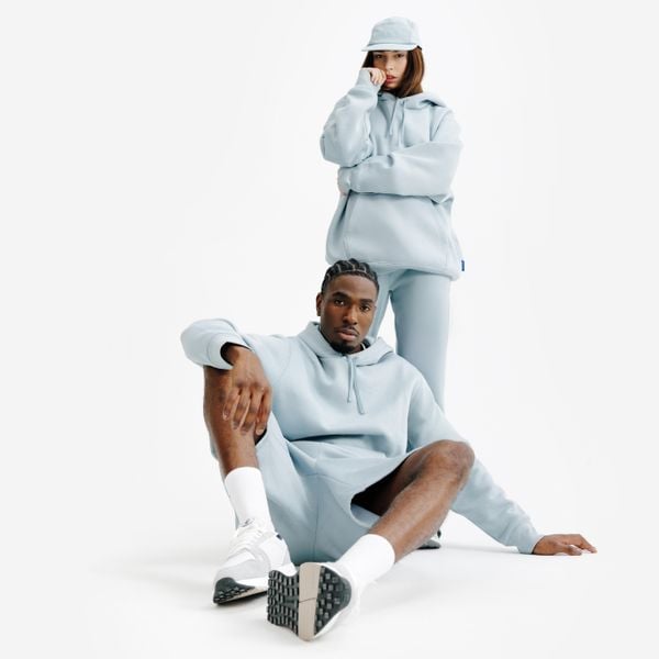 Bluza z kapturem unisex Elementals. Niebieskie bluzy męskie Decathlon, m, bez wzorów, z bawełny, z kapturem. W wyprzedaży za 119.99 zł.