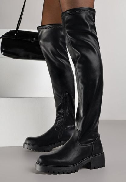 Czarne Kozaki z Dopasowaną Cholewką Typu Grunge Adevra. Czarne kozaki damskie Born2be, bez wzorów, z jeansu, bez obcasa, na płaskiej podeszwie, bez zapięcia. Za 169.99 zł.