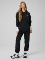 4F Spodnie z szerokimi nogawkami z modalem damskie - czarne XS. Czarne spodnie dresowe damskie 4F, bez wzorów, z dresówki. Za 189.99 zł.