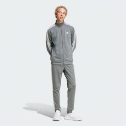 Dres męski adidas Basic 3-Stripes Tricot. Białe komplety dresowe męskie Adidas, m, bez wzorów, z dresówki. W wyprzedaży za 279.20 zł.