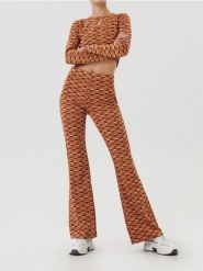 Legginsy flare ze wzorem geometrycznym - wielobarwny. Legginsy damskie Sinsay, bez wzorów. Za 59.99 zł.