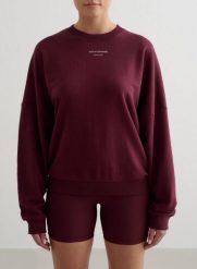 Damska bluza frotte, luźna, z okrągłym dekoltem Apparel Terry wiśniowa. Czerwone bluzy damskie Aim'n, l, bez wzorów, z dzianiny, bez ramiączek, bez kaptura. Za 297.00 zł.