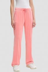 JUICY COUTURE Brzoskwiniowe damskie spodnie z cyrkoniami Tina, Rozmiar XS. Czerwone spodnie dresowe damskie Juicy Couture, bez wzorów, z dresówki. W wyprzedaży za 331.99 zł.