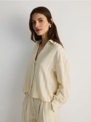 Koszula z wiskozą - jasnożółty. Żółte koszule damskie Reserved, l, bez wzorów, z bawełny, bez kołnierzyka, bez ramiączek. W wyprzedaży za 39.99 zł.