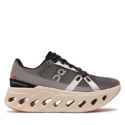Buty do biegania On. Brązowe obuwie sportowe damskie On, bez wzorów, bez zapięcia, do biegania. Za 649.99 zł.