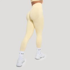 Legginsy damskie fitness bezszwowe Luma. Żółte legginsy damskie GYMBEAM, bez wzorów, z elastanu. Za 110.90 zł.