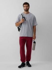 4F Spodnie dresowe joggery męskie - burgundowe XXL. Czerwone spodnie sportowe męskie 4F, l, bez wzorów, z dresówki. Za 149.99 zł.