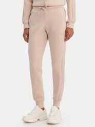 Guess Spodnie dresowe V2YB18 K7UW2 Beżowy Regular Fit. Brązowe spodnie dresowe damskie Guess, z aplikacjami, z dresówki. Za 369.99 zł.