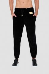 MOSCHINO Czarne welurowe spodnie dresowe. Czarne spodnie sportowe męskie MOSCHINO, l, bez wzorów, z dresówki. W wyprzedaży za 599.99 zł.