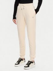 Guess Spodnie dresowe V3BB27 KBXI2 Beżowy Regular Fit. Brązowe spodnie dresowe damskie Guess, z aplikacjami, z dresówki. Za 189.99 zł.