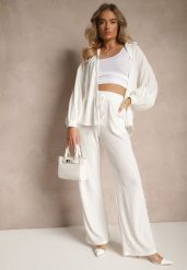 Białe Prążkowane Spodnie High Waist o Szerokim Kroju Belnella. Białe spodnie materiałowe damskie Renee, bez wzorów, z jeansu, eleganckie, z podwyższonym stanem. Za 109.99 zł.