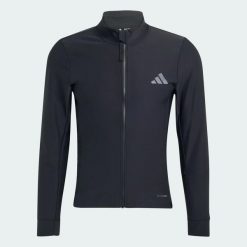 ZIMOWA KURTKA DO JAZDY NA ROWERZE CLIMAWARM. Czarne kurtki męskie Adidas, na zimę, l, bez wzorów, z dzianiny, bez kaptura, na fitness i siłownię, ClimaWarm (Adidas). Za 799.00 zł.