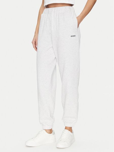 Guess Spodnie dresowe V5GB03 KCS01 Szary Regular Fit. Szare spodnie dresowe damskie Guess, z aplikacjami, z bawełny. Za 189.99 zł.