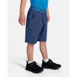 Pantaloncini da ragazzo Kilpi JOSEPH-JB. Niebieskie szorty damskie Kilpi, bez wzorów, sportowe. Za 91.56 zł.