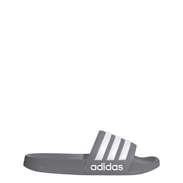 Klapki basenowe Adilette Shower Slides. Białe klapki damskie Adidas, bez wzorów, sportowe, bez obcasa, bez zapięcia. Za 119.00 zł.