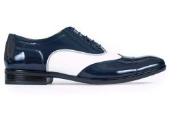 Biało-granatowe lakierki męskie - Spektatory, Al Capone, caponki, Austerity T16. Białe buty wizytowe męskie Modini Moda Męska, bez wzorów, ze skóry, bez obcasa, bez zapięcia. W wyprzedaży za 333.00 zł.