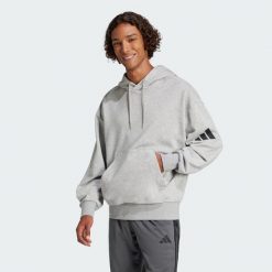 Bluza z kapturem Essentials Loose-Fit 3 Bar Logo French Terry. Czarne bluzy męskie Adidas, xl, bez wzorów, z materiału, z kapturem, na fitness i siłownię. W wyprzedaży za 139.50 zł.
