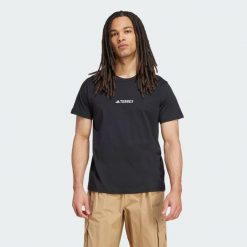 Koszulka Terrex Signature AOP Graphic. Czarne bluzki damskie Adidas, l, bez wzorów, z bawełny, sportowe, bez kołnierzyka, bez ramiączek. Za 149.00 zł.