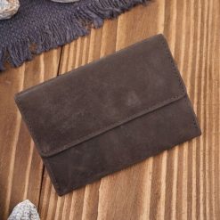 Paolo Peruzzi Portfel damski skórzany we wzory geometryczne mały vintage brązowy RFID T-112-HBR. Brązowe portfele damskie Paolo Peruzzi. Za 96.08 zł.