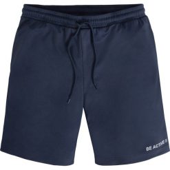 Lekkie spodnie sportowe z materiału funkcjonalnego, krótkie nogawki. Czarne spodnie sportowe męskie bonprix, l, bez wzorów. Za 59.99 zł.