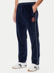 Tommy Hilfiger Spodnie dresowe Gift Crest MW0MW45207 Granatowy Regular Fit. Niebieskie spodnie sportowe męskie Tommy Hilfiger, m, bez wzorów, z dresówki. Za 649.99 zł.