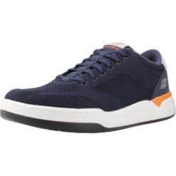Buty SKECHERS 210793S Niebieski. Niebieskie buty sportowe męskie Skechers, bez wzorów, z gumy, bez zapięcia. W wyprzedaży za 300.50 zł.