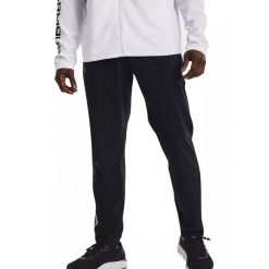 Spodnie treningowe męskie Under Armour Storm Run. Czarne spodnie sportowe męskie Under Armour, m, bez wzorów, narciarskie. Za 129.99 zł.