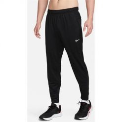 Spodnie sportowe damskie Nike Totality. Czarne spodnie dresowe damskie Nike, bez wzorów, z dresówki, sportowe, długie. Za 397.00 zł.