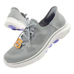 Buty damskie sportowe Skechers Go Walk 7-Via SLIP-INS. Szare obuwie sportowe damskie Skechers, bez wzorów, bez zapięcia, trekkingowe. Za 229.00 zł.