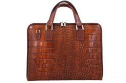 Torba na laptopa skórzana BARBERINI'S 118/1-6 brązowa. Brązowe torby na laptopa damskie Barberinis, bez wzorów, ze skóry, na ramię, duże, z tłoczeniem. Za 359.99 zł.