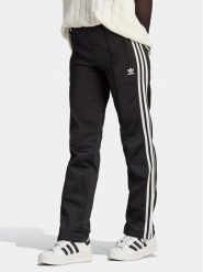 Adidas Spodnie dresowe adicolor Classics Firebird IL8763 Czarny Regular Fit. Czarne spodnie dresowe damskie Adidas, bez wzorów, z dresówki. Za 189.99 zł.