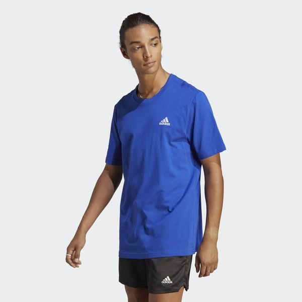 Koszulka sportowa męska adidas Essentials. Niebieskie koszulki sportowe męskie Adidas, l, bez wzorów, bez ramiączek, do piłki nożnej. Za 96.00 zł.