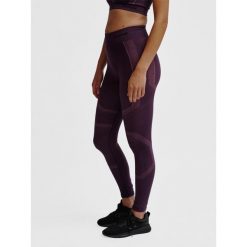 Legginsy damskie Hummel hmlMT. Czerwone legginsy damskie Hummel, bez wzorów. Za 177.00 zł.