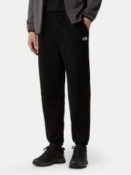 The North Face Spodnie dresowe Glacier NF0A8D0T Czarny Regular Fit. Czarne spodnie sportowe męskie The North Face, m, bez wzorów, z dresówki. Za 299.99 zł.