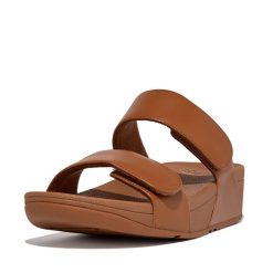 Skórzane sandały dla kobiet FitFlop Lulu Adjustable. Czarne sandały damskie FIT FLOP, bez wzorów, z materiału, bez obcasa, bez zapięcia. Za 483.50 zł.
