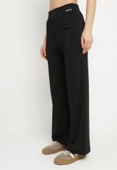Czarne Szerokie Spodnie z Wysokim Stanem Efalissa. Czarne spodnie materiałowe damskie Born2be, bez wzorów, z jeansu, eleganckie, z podwyższonym stanem. Za 49.99 zł.