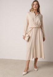 Beżowa Wiskozowa Sukienka Koszulowa z Marszczeniem i Guzikiem w Talii Lennatha. Brązowe sukienki damskie Born2be, na co dzień, l, bez wzorów, z materiału, eleganckie, bez kołnierzyka, bez ramiączek, koszulowe. Za 139.99 zł.