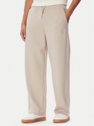Guess Spodnie dresowe Z6BB01 K6526 Beżowy Regular Fit. Brązowe spodnie sportowe męskie Guess, m, z aplikacjami, z dresówki. Za 434.99 zł.