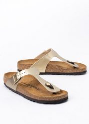 BIRKENSTOCK GIZEH BF Klapki damskie. Żółte klapki damskie Birkenstock, bez wzorów, z materiału, eleganckie, bez obcasa, bez zapięcia. Za 269.99 zł.