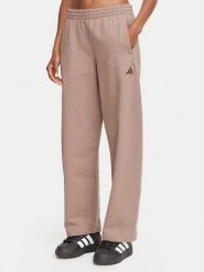 Adidas Spodnie dresowe Small Logo KV9838 Beżowy ciemny Barrel Fit. Brązowe spodnie dresowe damskie Adidas, bez wzorów, z bawełny. Za 279.99 zł.