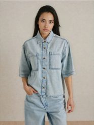 Jeansowa koszula z krótkim rękawem - niebieski. Niebieskie koszule damskie Sinsay, l, bez wzorów, z jeansu, bez kołnierzyka, bez ramiączek. Za 59.99 zł.