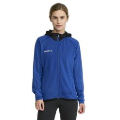 Damska kurtka dresowa z pełnym zamkiem błyskawicznym Craft Extend. Niebieskie kurtki sportowe damskie Craft, m, bez wzorów, z dresówki, bez ramiączek, bez kaptura, na fitness i siłownię. Za 341.00 zł.