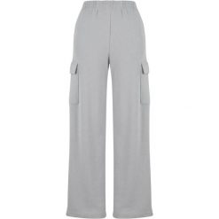 Spodnie dresowe damskie baggy Urban Classics Light Terry. Szare spodnie dresowe damskie Urban Classics, bez wzorów, z dresówki, sportowe, długie. Za 138.00 zł.